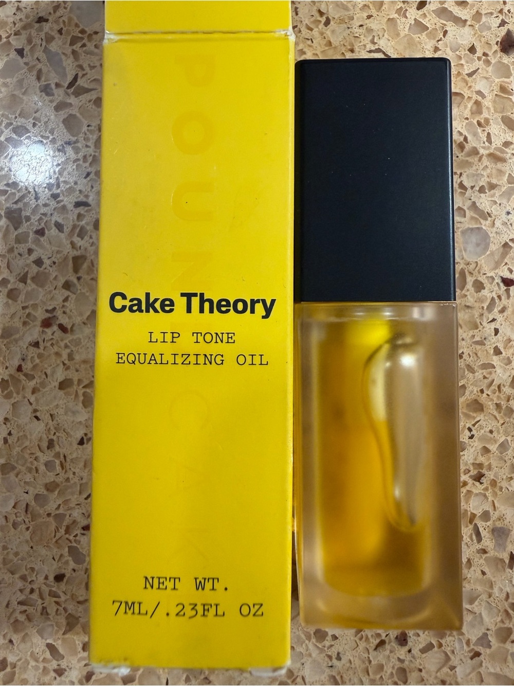 Theory Yellow & Black Lip Tone Equalizing Oil